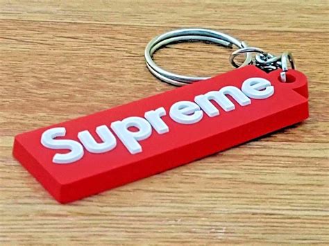 supreme metal box logo keychain|supreme clip keychains.